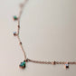 emerald gem jewels with rose gold chain