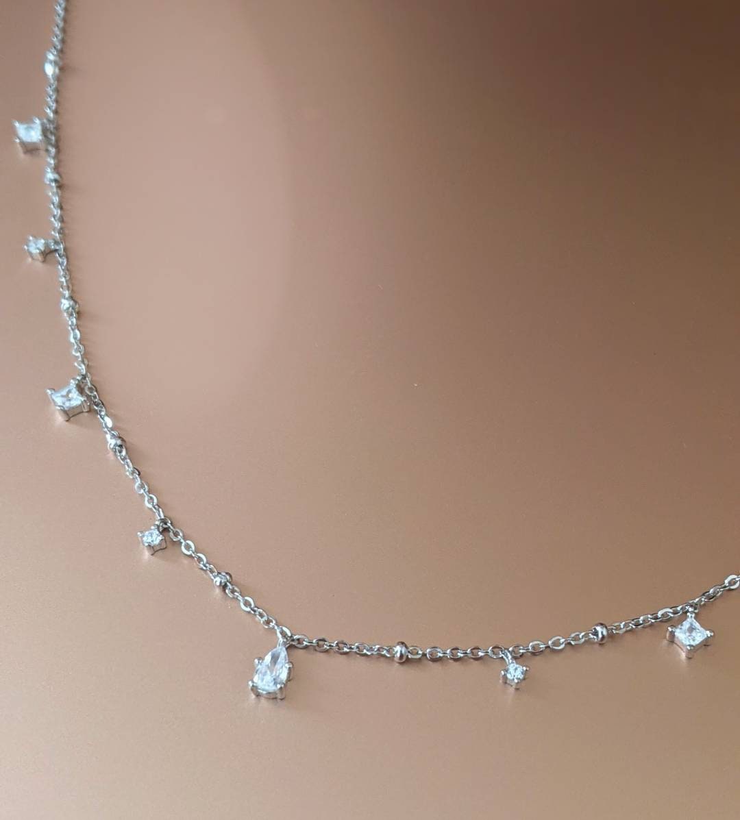 White clear cubic zircon gems jewels in silver chain