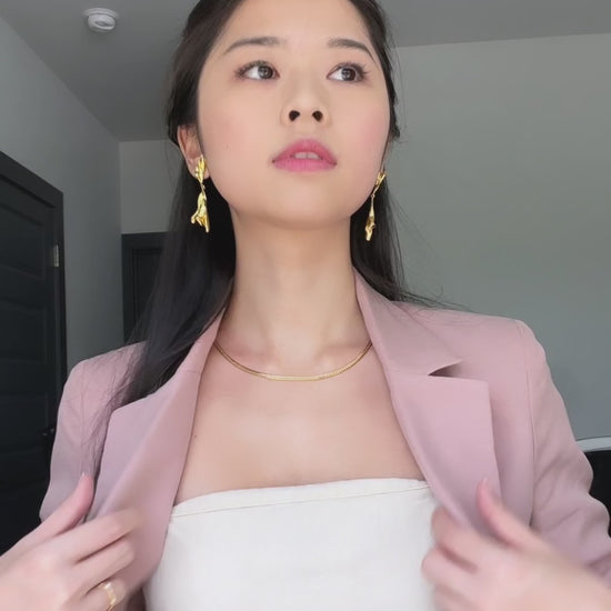 video of model wearing mermaid minimalist pearl necklace