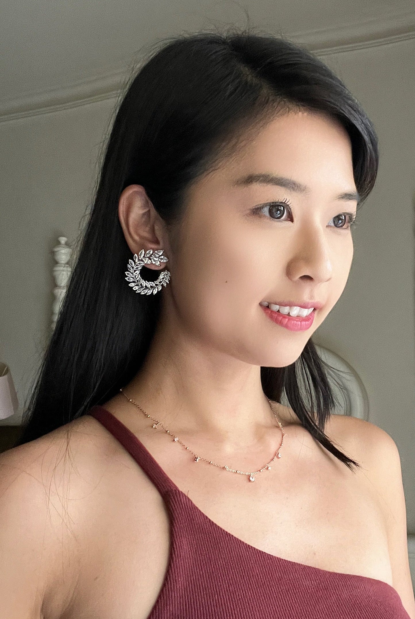 Model wearing wedding earrings for brides with cubic zirconia 