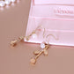 gold rose earrings dangle with pearl