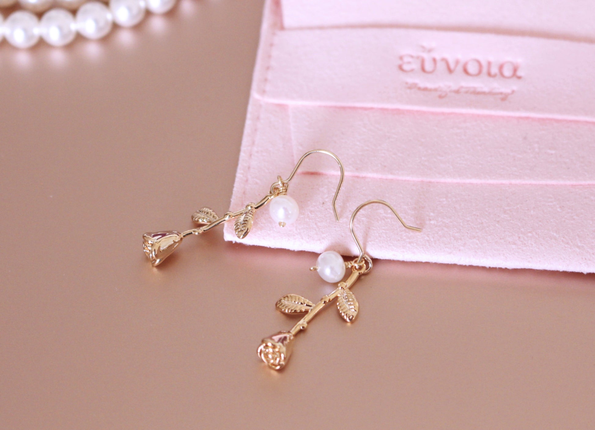 gold rose earrings dangle with pearl