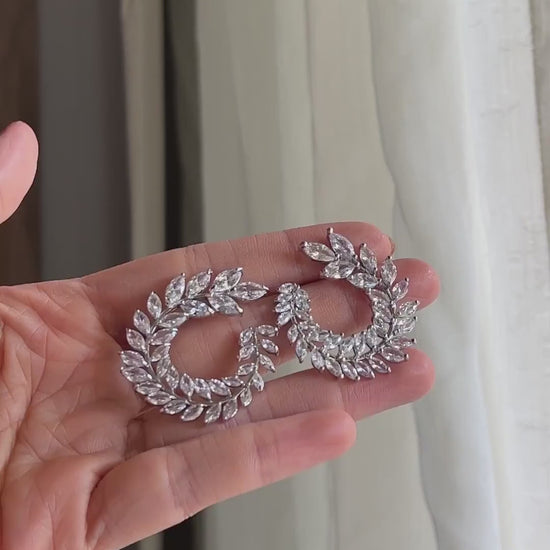 Video of model wearing Aurelia Cubic Zirconia Stud Earrings