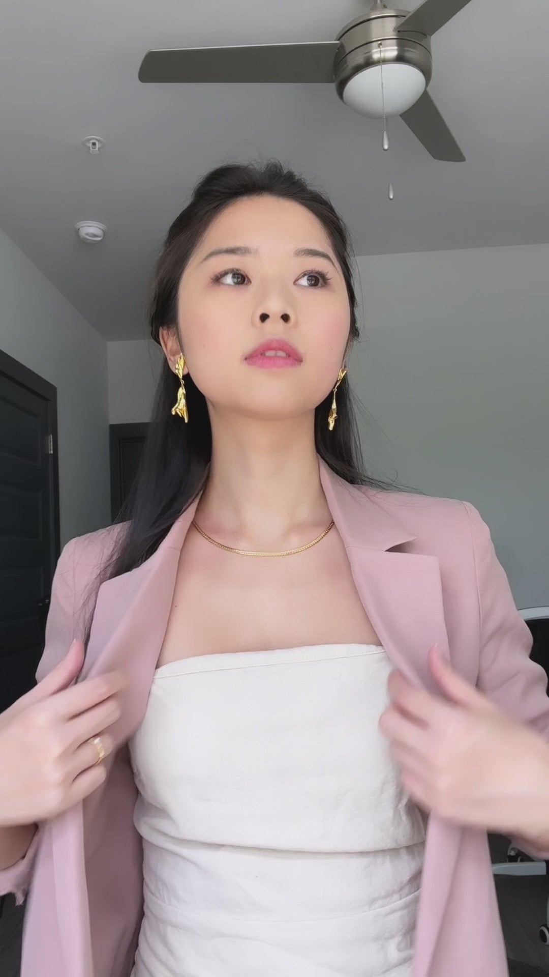 Video of model wearing glamorous jewelry 