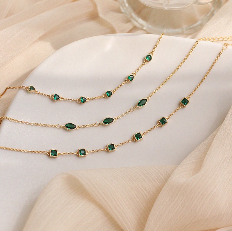 Buy JEWELZ Gold Plated Link Bracelet With Sea Green Beads And Designer  Pendants | Shoppers Stop