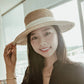 model wearing fedora hats for women