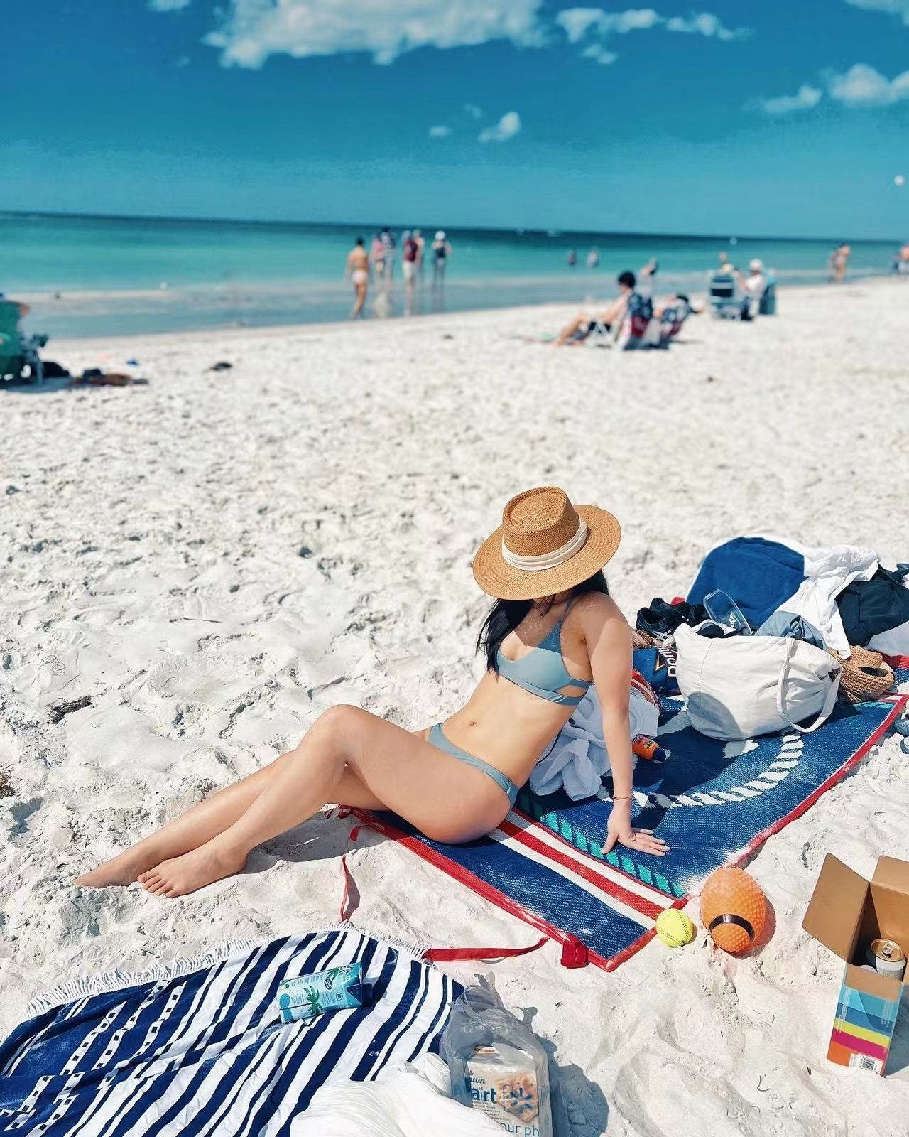 women model wearing beach hat on the Indian Rock beach