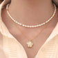 Elegant pearl chain and shell pendant necklace