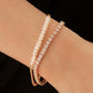 tennis bracelet women and pearl bracelet on a wrist