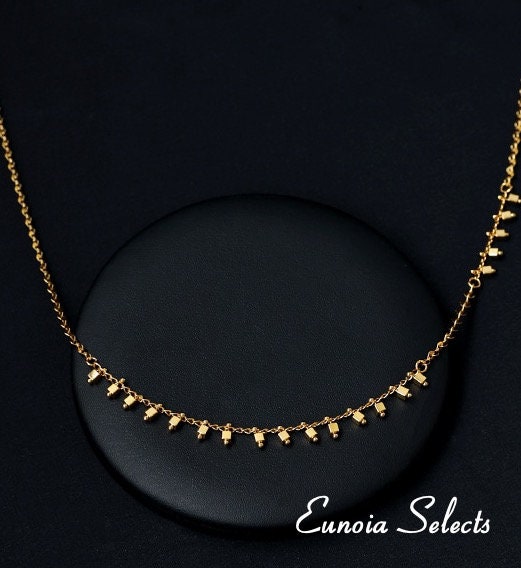 gold beads necklace office jewelry