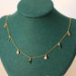 emerald green necklace may birthstone gift for women